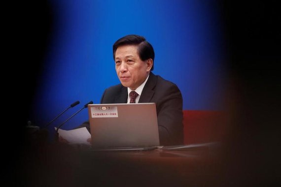 Zhang Yesui, a spokesman for National People's Congress (NPC), addresses reporters ahead of China's annual session of parliament at the Great Hall of the People in Beijing, China March 4, 2018. REUTERS/Damir Sagolj