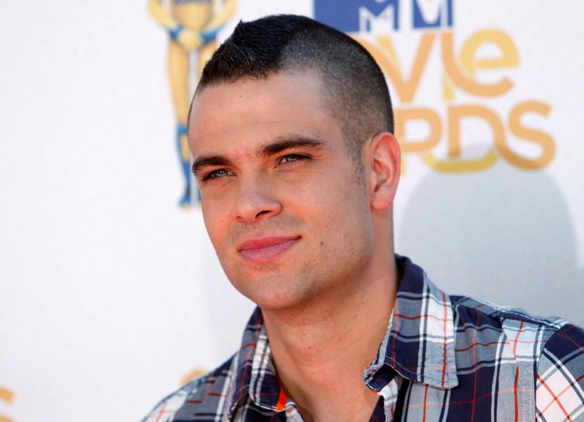 FILE PHOTO: Actor Mark Salling from the television show 'Glee' arrives at the 2010 MTV Movie Awards in Los Angeles, California, U.S. June 6, 2010. REUTERS/Danny Moloshok/File Photo