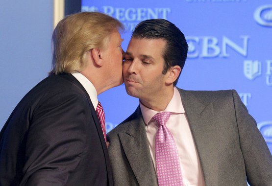 U.S. Republican presidential candidate Donald Trump kisses his son Donald, Jr. at a campaign event at Regents University in Virginia Beach, Virginia February 24, 2016. REUTERS/Joshua Roberts - RTX28EY5