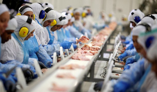 Employees are seen during a technical visit of Brazil's Agriculture Minister Blairo Maggi at the Brazilian meatpacker JBS SA in the city of Lapa, Parana state, Brazil, March 21, 2017. REUTERS/Ueslei Marcelino