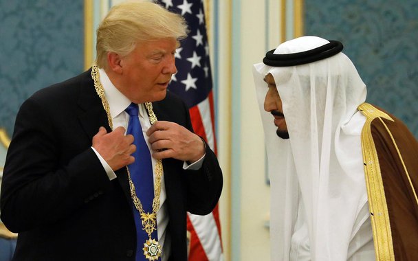 Saudi Arabia's King Salman bin Abdulaziz Al Saud (R) presents U.S. President Donald Trump with the Collar of Abdulaziz Al Saud Medal at the Royal Court in Riyadh, Saudi Arabia May 20, 2017. REUTERS/Jonathan Ernst TPX IMAGES OF THE DAY