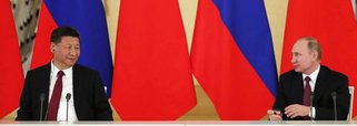 Presidente russo, Vladimir Putin, e presidente da China, Xi Jinping, durante encontro em Moscou. 04/07/2017 REUTERS/Sergei Ilnitsky