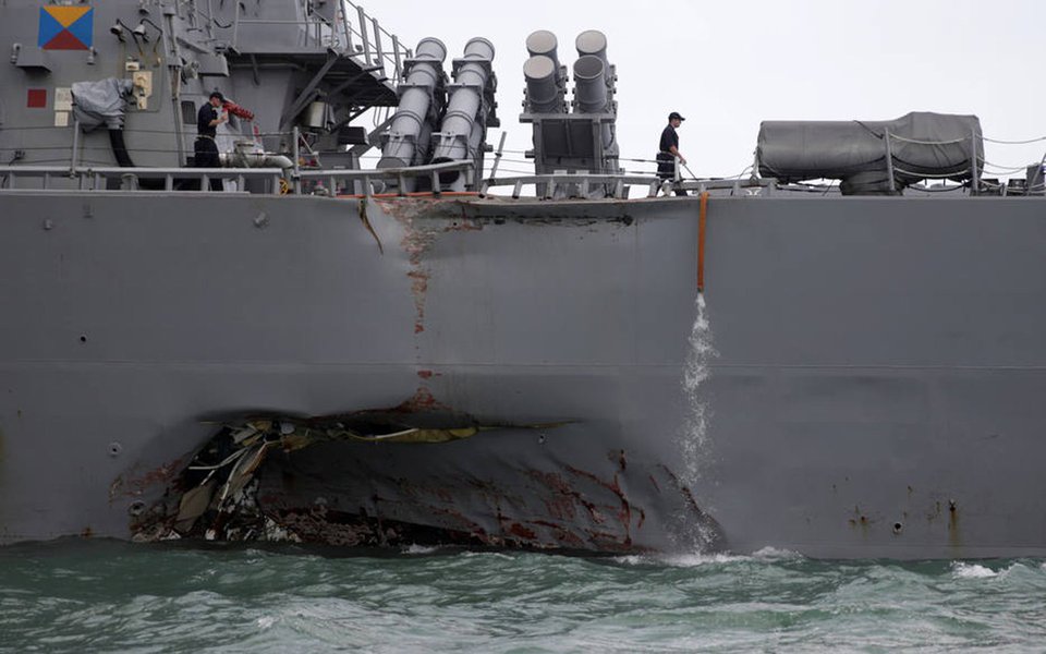 The U.S. Navy guided-missile destroyer USS John S. McCain is seen after a collision, in Singapore waters August 21, 2017. REUTERS/Ahmad Masood