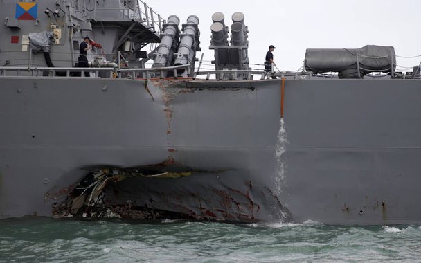 The U.S. Navy guided-missile destroyer USS John S. McCain is seen after a collision, in Singapore waters August 21, 2017. REUTERS/Ahmad Masood