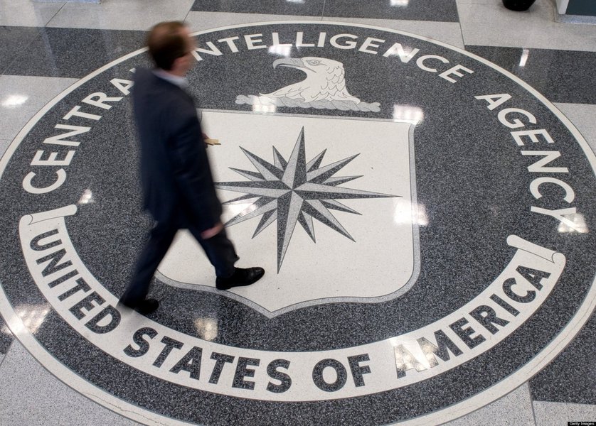 A man crosses the Central Intelligence Agency (CIA) logo in the lobby of CIA Headquarters in Langley, Virginia, on August 14, 2008. AFP PHOTO/SAUL LOEB (Photo credit should read SAUL LOEB/AFP/Getty Images)