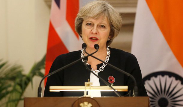 Britain's Prime Minister Theresa May (L) reads a joint statement with her Indian counterpart Narendra Modi (unseen) at Hyderabad House in New Delhi, India, November 7, 2016. REUTERS/Adnan Abidi