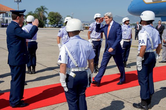 U.S. Secretary of State John Kerry walks with U.S. Consul General in Rio de Janiero James Stoy
 