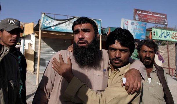 Relatives of police cadets wait for word outside the Police Training Center after an attack on the center in Quetta, Pakistan October 25, 2016. REUTERS/Naseer Ahmed