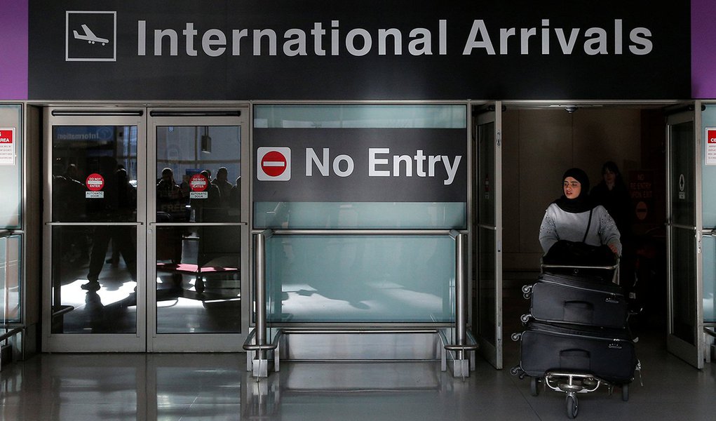 An international traveler arrives after U.S. President Donald Trump's executive order travel ban at Logan Airport in Boston, Massachusetts, U.S. January 30, 2017. REUTERS/Brian Snyder
