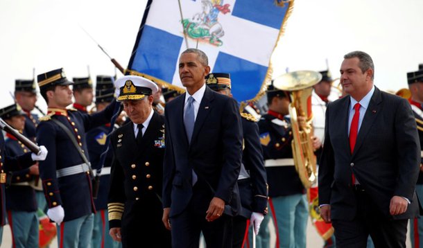 U.S. President Barack Obama reviews an honor guard with Greek Defense Minister Panos Kammenos (R) upon his arrival in Athens, Greece November 15, 2016. REUTERS/Kevin Lamarque