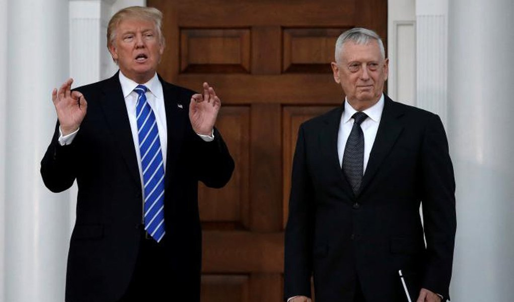 FILE PICTURE: U.S. President-elect Donald Trump stands with retired Marine Gen. James Mattis following their meeting at the main clubhouse at Trump National Golf Club in Bedminster, New Jersey, U.S., November 19, 2016. REUTERS/Mike Segar/File Photo