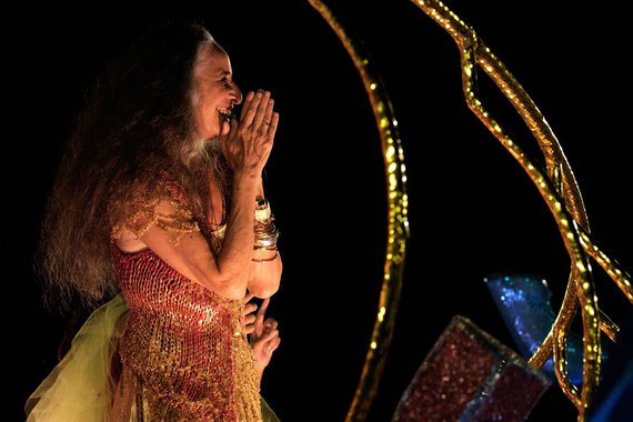 Brazilian singer Maria Bethania of Mangueira samba school gestures during the second night of the carnival parade at Sambadrome in Rio de Janeiro, Brazil, on February 9, 2016. AFP PHOTO / YASUYOSHI CHIBA
