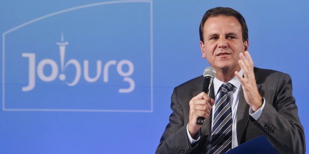 Rio's mayor and C40 chairman Eduardo Paes takes part in a debate on the first day of the C40 Cities climate summit in Johannesburg on February 5, 2014. AFP PHOTO/MARCO LONGARI (Photo credit should read MARCO LONGARI/AFP/Getty Images)