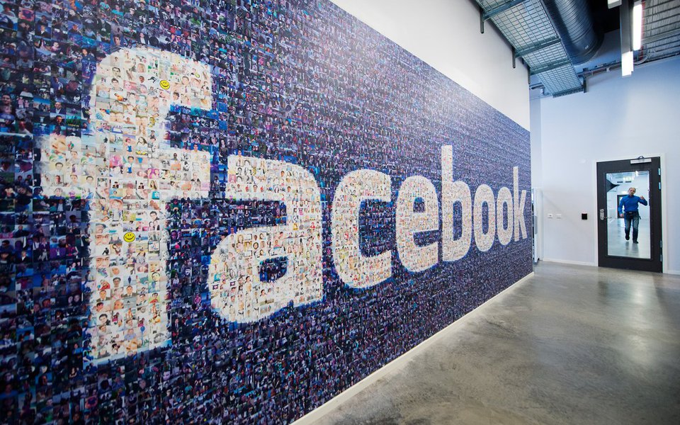 A big logo created from pictures of Facebook users worldwide is pictured in the company's Data Center, its first outside the US on November 7, 2013 in Lulea, in Swedish Lapland. The company began construction on the facility in October 2011 and went live 