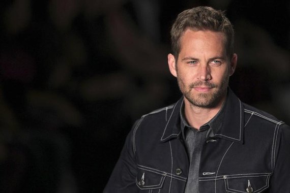 Paul Walker desfilando no São Paulo Fashion Week. 22/03/2013 REUTERS/Filipe Carvalho