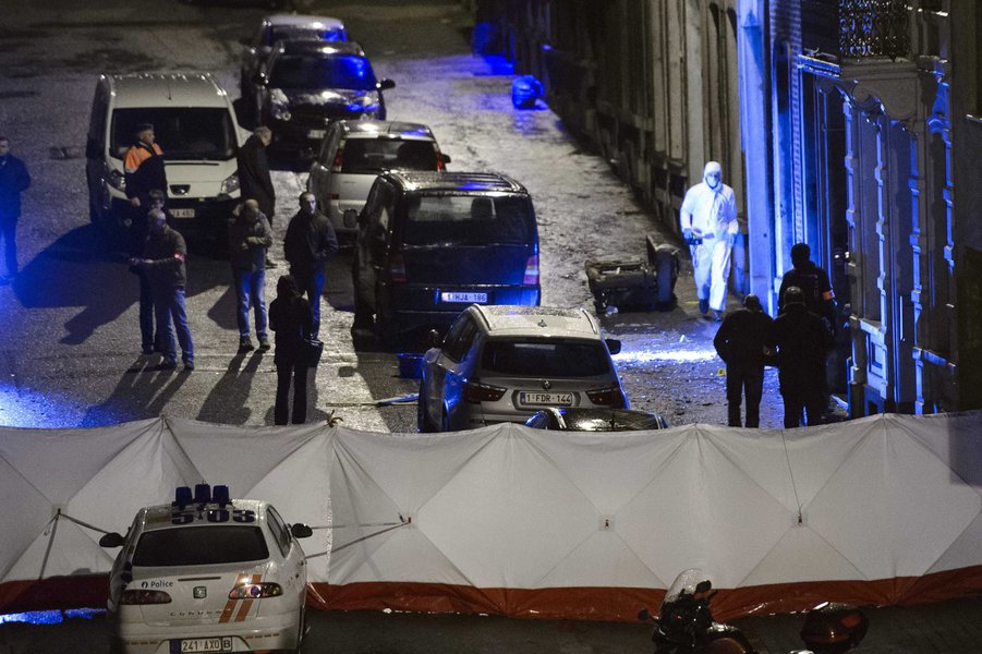 Belgian police inspect an apartment in central Verviers
