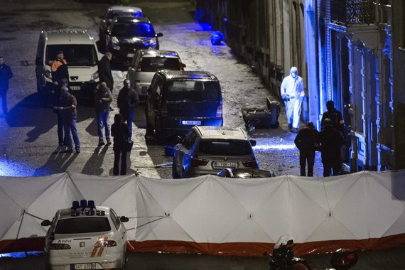 Belgian police inspect an apartment in central Verviers