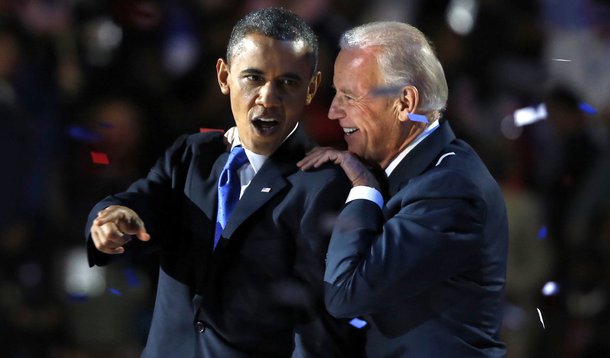 U.S. President Barack Obama gestures with Vice President Joe Biden after his election night victory speech in Chicago, November 6, 2012. REUTERS/Larry Downing (UNITED STATES - Tags: POLITICS TPX IMAGES OF THE DAY USA PRESIDENTIAL ELECTION ELECTIONS)