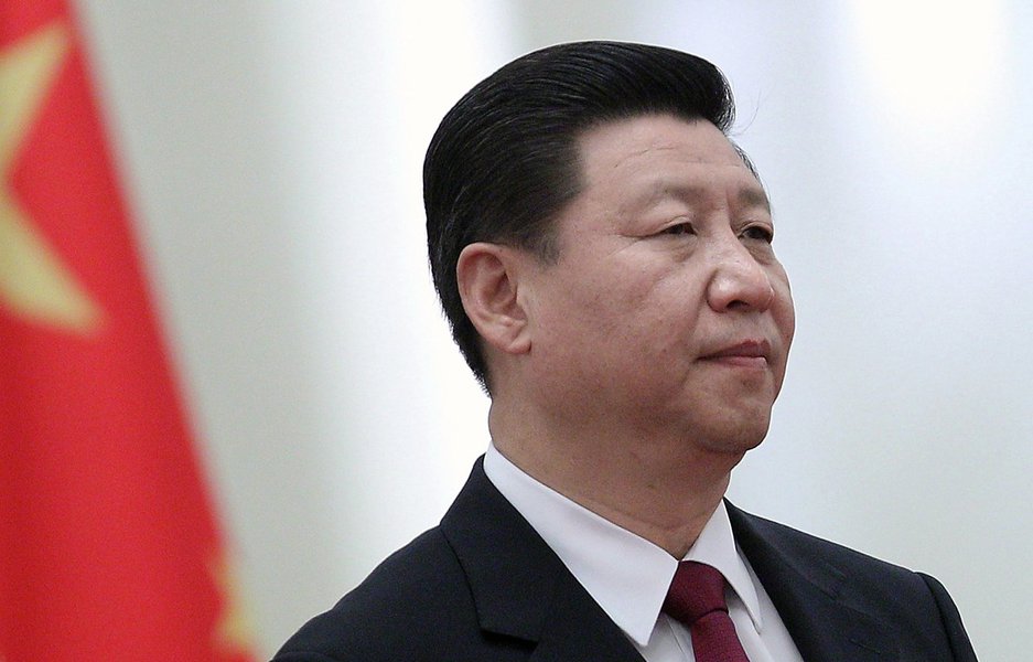 (FILES) This file photo taken on September 28, 2011 shows Chinese Vice President Xi Jinping taking part in a ceremony at the Great Hall of the People in Beijing.  A health scare was the likely reason for the unexplained absence of Xi Jinping, as secrecy s