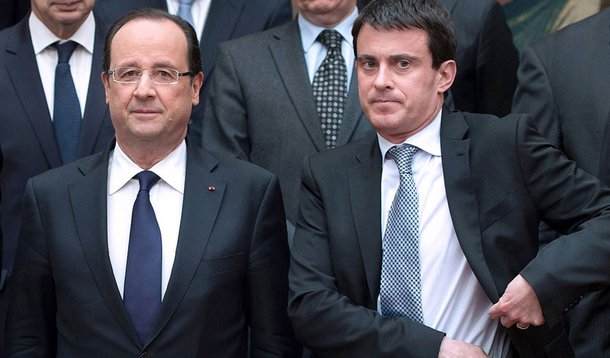 France's President Francois Hollande (2ndR) poses with (first row) French Defence Minister Jean-Yves Le Drian (L), French Minister of Foreign Affairs Laurent Fabius (2ndL), French Interior Minister Manuel Valls (R) and members of the White Book of Defence