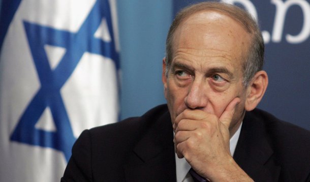 JERUSALEM, ISRAEL - JUNE 28: Israeli Prime Minister Ehud Olmert looks on during an awarding ceremony fo arts, science and culture at his office on  June 28, 2006 in Jerusalem, Israel. Early Wednesday Israel sent in troops and tanks into the southern Gaza 