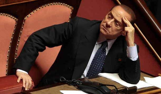 Italian center-right leader Silvio Berlusconi (R) looks on at the Senate in Rome, October 2, 2013.  Italian Prime Minister Enrico Letta said on Wednesday his government could achieve reforms even with a smaller majority, as he wound up a debate on a confi
