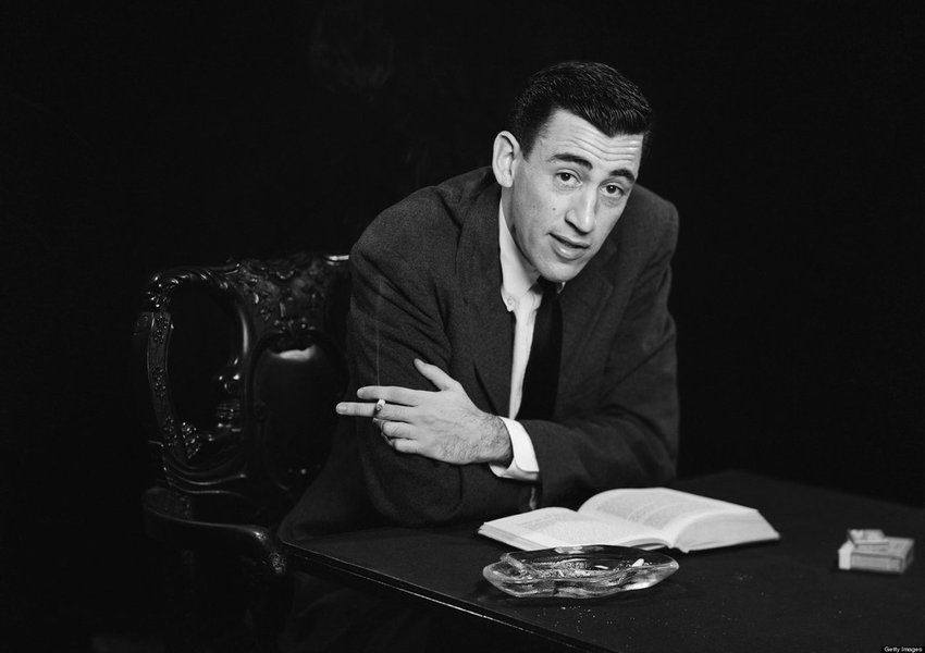 NEW YORK - NOVEMBER 20, 1952: Author JD Salinger poses for a portrait as he reads from his classic American novel "The Catcher in the Rye" on November 20, 1952 in the Brooklyn borough of New York City. Salinger died on January 27, 2010. (Photo by Antony D