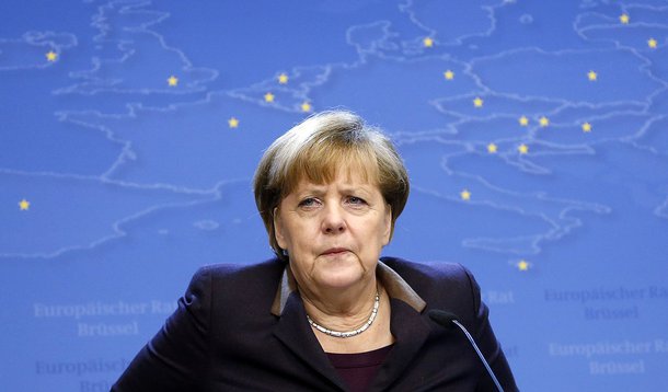 Germany's Chancellor Angela Merkel addresses a news conference at the end of a European Union leaders summit in Brussels December 20, 2013.  REUTERS/Francois Lenoir (BELGIUM - Tags: POLITICS)