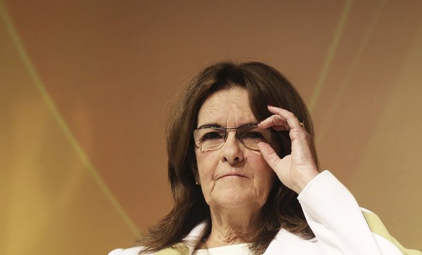 Chief Executive Officer of Brazil's state oil company Petrobras Maria das Gracas Silva Foster adjusts her glasses as she talks to the audience during a conference about "Building a better working World" in Sao Paulo October 24, 2013. Brazil's state-run oi