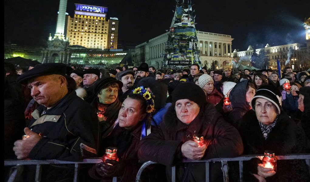 People attend a rally in Independence Square in Kiev, February 26, 2014. Ukraine's protest leaders on Wednesday named former economy minister Arseny Yatseniuk as their choice to head a new government following the overthrow of President Viktor Yanukovich.