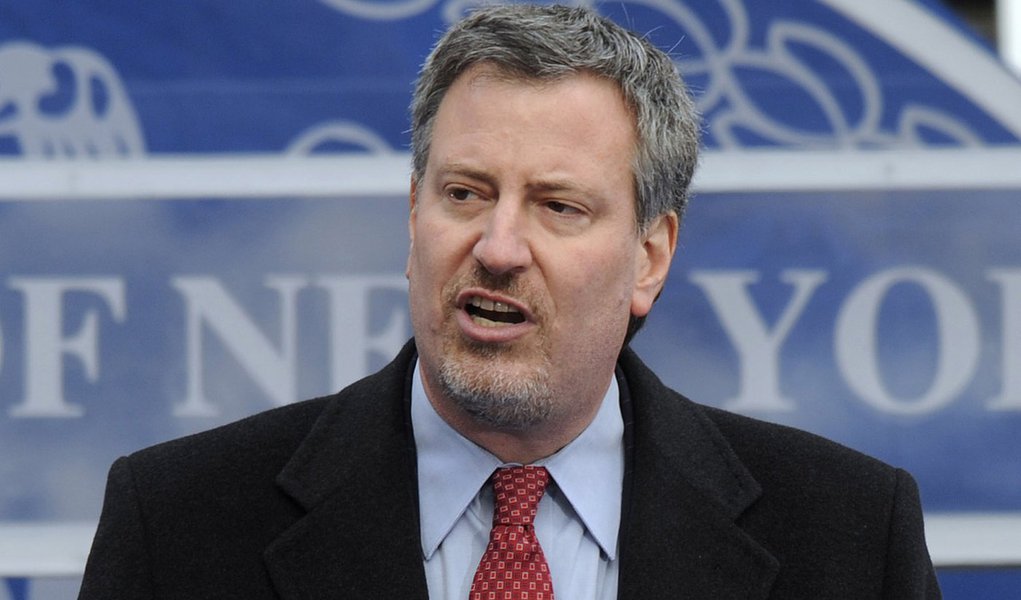 FILE - In this file photo of Jan. 1, 2010, New York City Public Advocate Bill de Blasio delivers his acceptance speech after being sworn in during a ceremony on the steps of City Hall in New York. The 51-year-old  Brooklyn resident announced Sunday, Jan. 