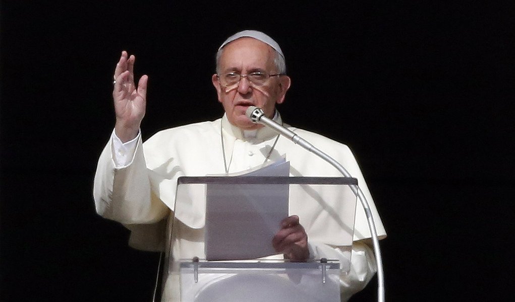 Pope Francis delivers a speech during  the Angelus prayer from the window of the Apostolic palace in Saint Peter's Square at the Vatican January 12, 2014. Pope Francis said on Sunday he will next month elevate 19 prelates to the rank of cardinal, his firs