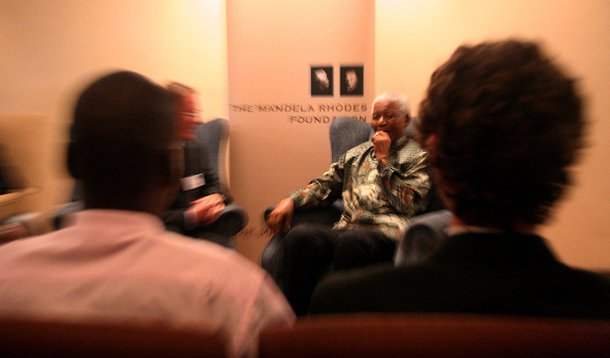 Former state president, Nelson Mandela, shares a moment with Anton Botha of the Nelson Mandela Metropolitan University in the Eastern Cape. Mandela was speaking to the Mandela Rhodes Scholars for 2008 at The Nelson Mandela Foundation in Houghton. PHOTO BY