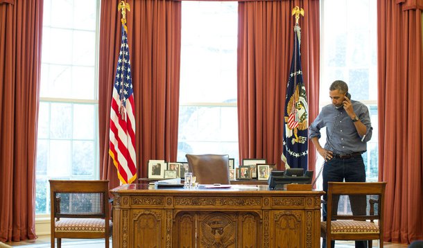 President Barack Obama talks on the phone in the Oval Office with Russian President Vladimir Putin about the situation in Ukraine, March 1, 2014.
(Official White House Photo by Pete Souza)