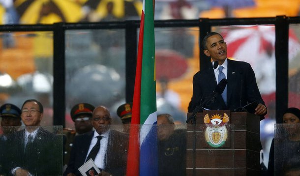 U.S. President Barack Obama delivers his speech at the memorial service for late South African President Nelson Mandela at the FNB soccer stadium in Johannesburg December 10, 2013. World leaders, from U.S. President Barack Obama to Cuba's Raul Castro, wil