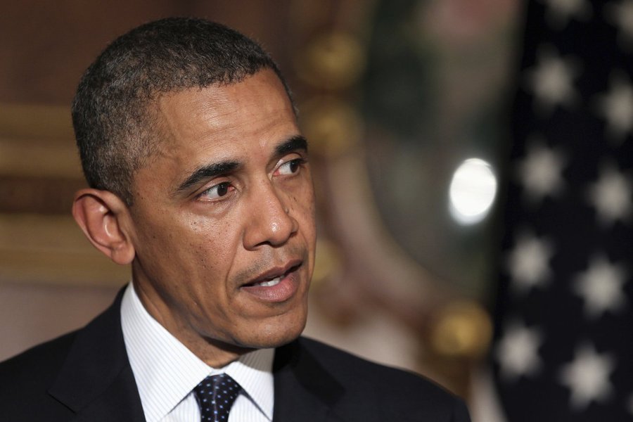 U.S. President Barack Obama addresses a news conference with Japanese Prime Minister Shinzo Abe (not seen) at the Akasaka guesthouse in Tokyo April 24, 2014. Obama used a state visit to Japan on Thursday to try to reassure Asian allies of his commitment t