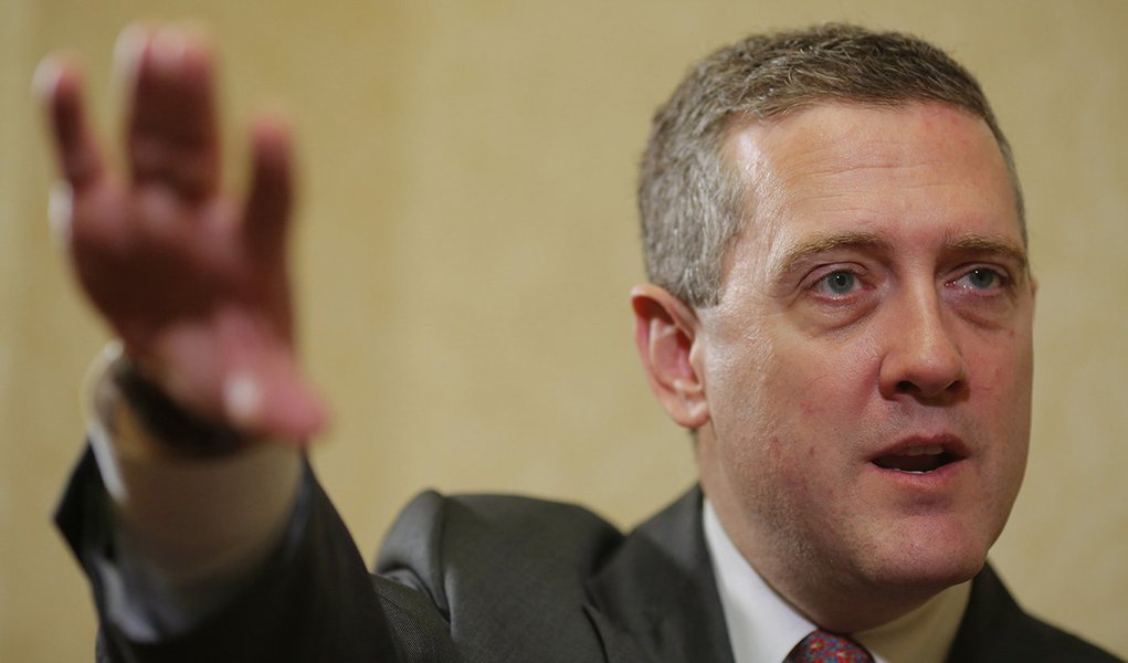 James Bullard, President of the St. Louis Federal Reserve Bank, speaks during an interview with Reuters in Boston, Massachusetts August 2, 2013. Bullard said on Friday that the U.S. economy is improving modestly but needs to gather more steam, while infla