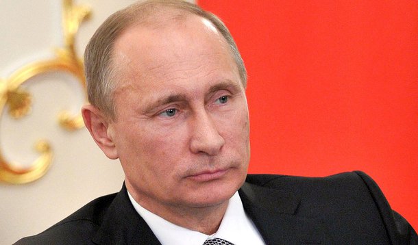 Russia's President Vladimir Putin chairs a meeting in his Novo-Ogaryovo residence outside Moscow, on February 26, 2013. French President Francois Hollande arrives in Moscow for his first visit as head of state and talks with Vladimir Putin tomorrow. AFP P