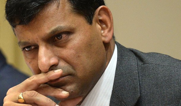 Reserve Bank of India (RBI) governor, Raghuram Rajan pauses during a news conference at the RBI headquarters in Mumbai on September 20, 2013. India's new central bank governor marked his first policy meeting on September 20 with a bold decision to hike in