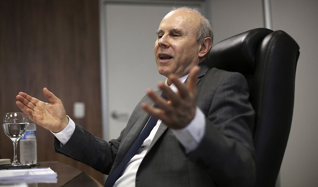 Brazil's Finance Minister Guido Mantega speaks during an interview with Reuters in Sao Paulo October 10, 2013. REUTERS/Nacho Doce (BRAZIL - Tags: POLITICS BUSINESS)