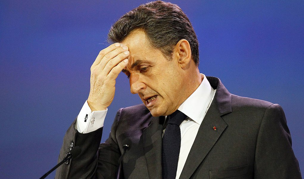 France's President and candidate for the upcoming presidential election, Nicolas Sarkozy delivers his speech during Competitiveness Challenge meeting in Paris, Tuesday, March 13, 2012. (AP Photo/Francois Mori)