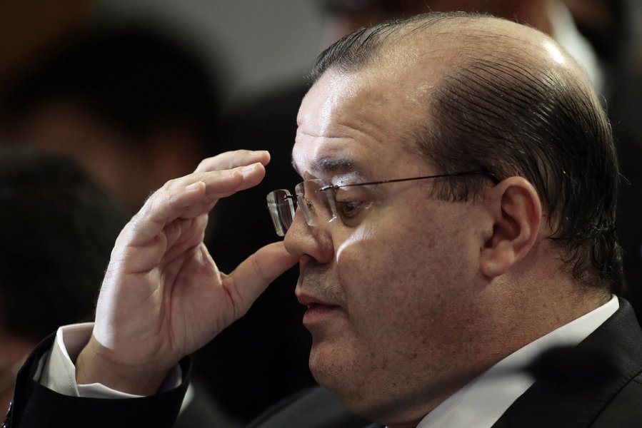Brazilian central bank chief Alexandre Tombini reacts during for a public hearing on the Economic Affairs Committee at the Brazilian Federal Senate in Brasilia December 10, 2013. The sooner the U.S. Federal Reserve starts to scale back its massive economi
