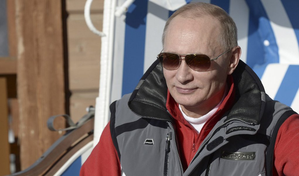 Russian President Vladimir Putin looks on during his visit to the "Laura" cross country ski and biathlon centre in the resort of Krasnaya Polyana near Sochi January 3, 2014.  REUTERS/Alexei Nikolskiy/RIA Novosti/Kremlin (RUSSIA - Tags: POLITICS SPORT OLYM
