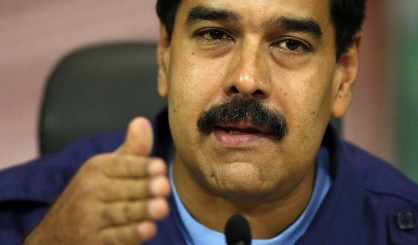 Venezuelan President Nicolas Maduro attends a press conference at Miraflores Palace in Caracas February 21, 2014. Venezuela's jailed protest leader urged supporters on Friday to keep demonstrating peacefully against President Maduro despite violence that 