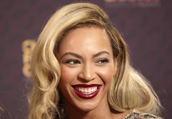 Singer Beyonce poses for photographs at "The Sound of Change" concert at Twickenham Stadium in London June 1, 2013.  REUTERS/Neil Hall (BRITAIN - Tags: ENTERTAINMENT HEADSHOT)