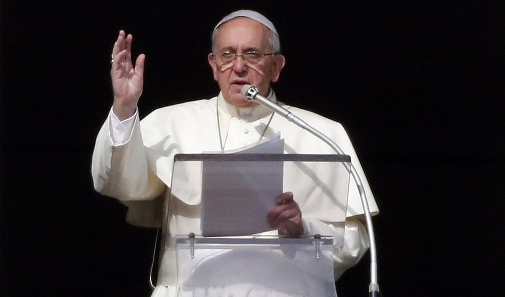 Pope Francis delivers a speech during  the Angelus prayer from the window of the Apostolic palace in Saint Peter's Square at the Vatican January 12, 2014. Pope Francis said on Sunday he will next month elevate 19 prelates to the rank of cardinal, his firs