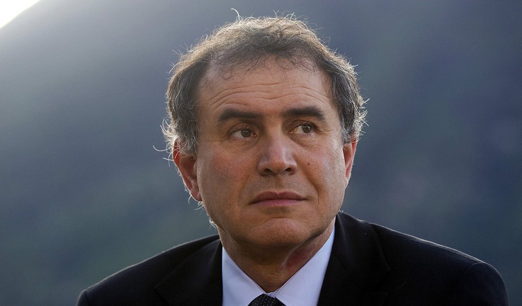 Nouriel Roubini, co-founder and chairman of Roubini Global Economics LLC, pauses during a television interview at the Ambrosetti Workshop in Cernobbio, near Como, Italy, on Friday, March 30, 2012. The two day workshop brings together politicians, company 