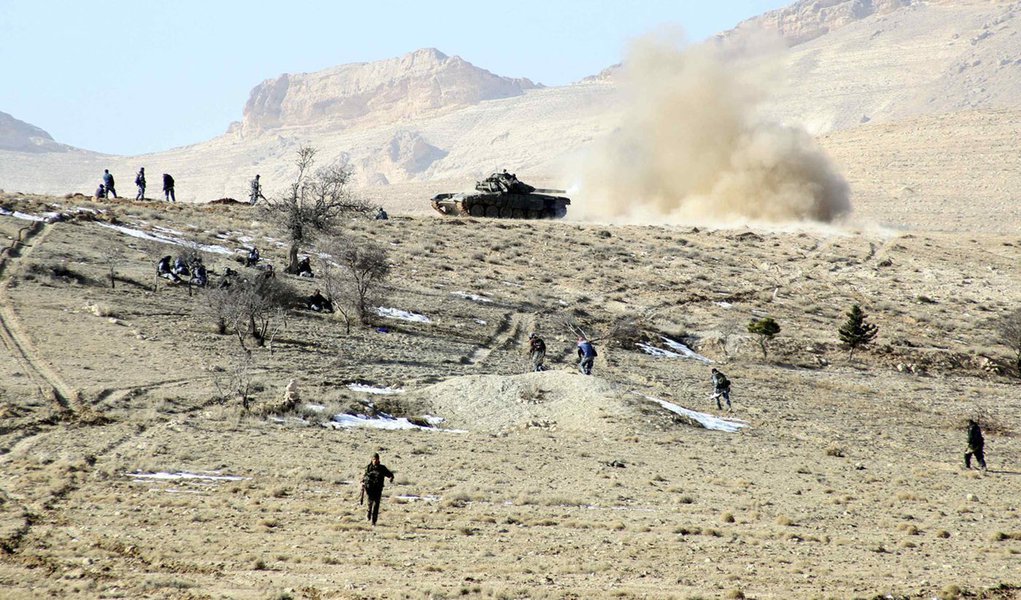 Forces loyal to Syria's President Bashar al-Assad are seen in the Qalamoun mountains north of Damascus, in this handout photograph distributed by Syria's national news agency SANA on December 27, 2013. Syria's army ambushed Islamist fighters in the Qalamo