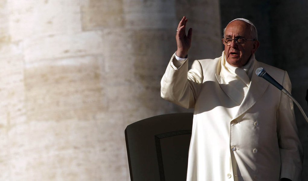 Pope Francis blesses at the end of his weekly general audience at St. Peter's Square at the Vatican December 11, 2013. Time magazine named Pope Francis its Person of the Year on Wednesday, crediting him with shifting the message of the Catholic Church whi