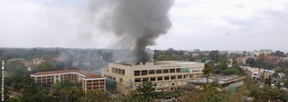 Smoke rises from the Westgate shopping centre in Nairobi following a string of explosions during the third day of a stand-off between Kenyan security forces and gunmen inside the building September 23, 2013. Powerful explosions sent thick smoke billowing 